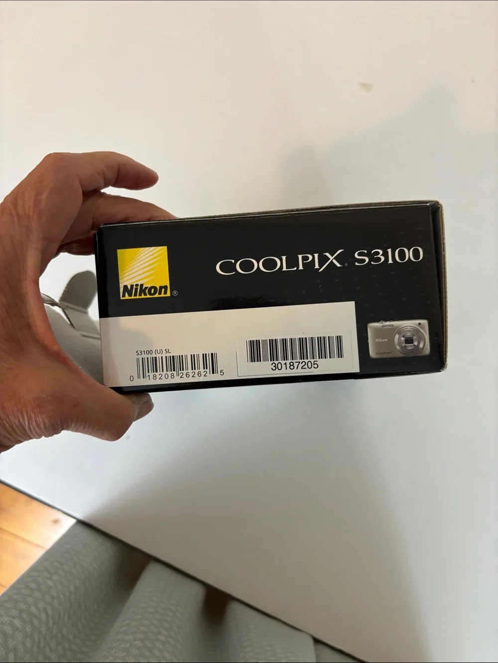Nikon Coolpix S3100 camera with charger box and everything shown